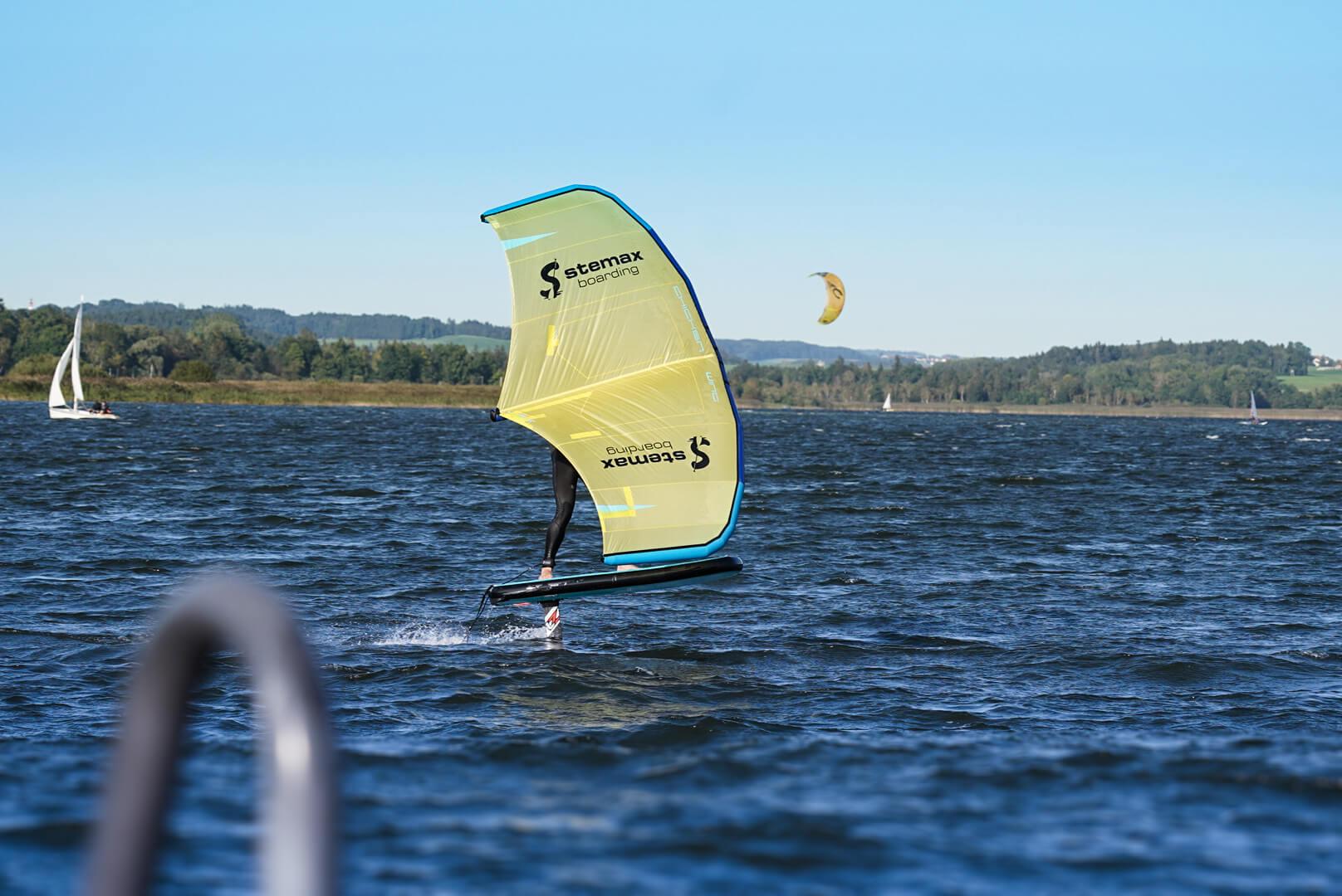 Stemax Boarding | Person Foiling with Wing in the Water